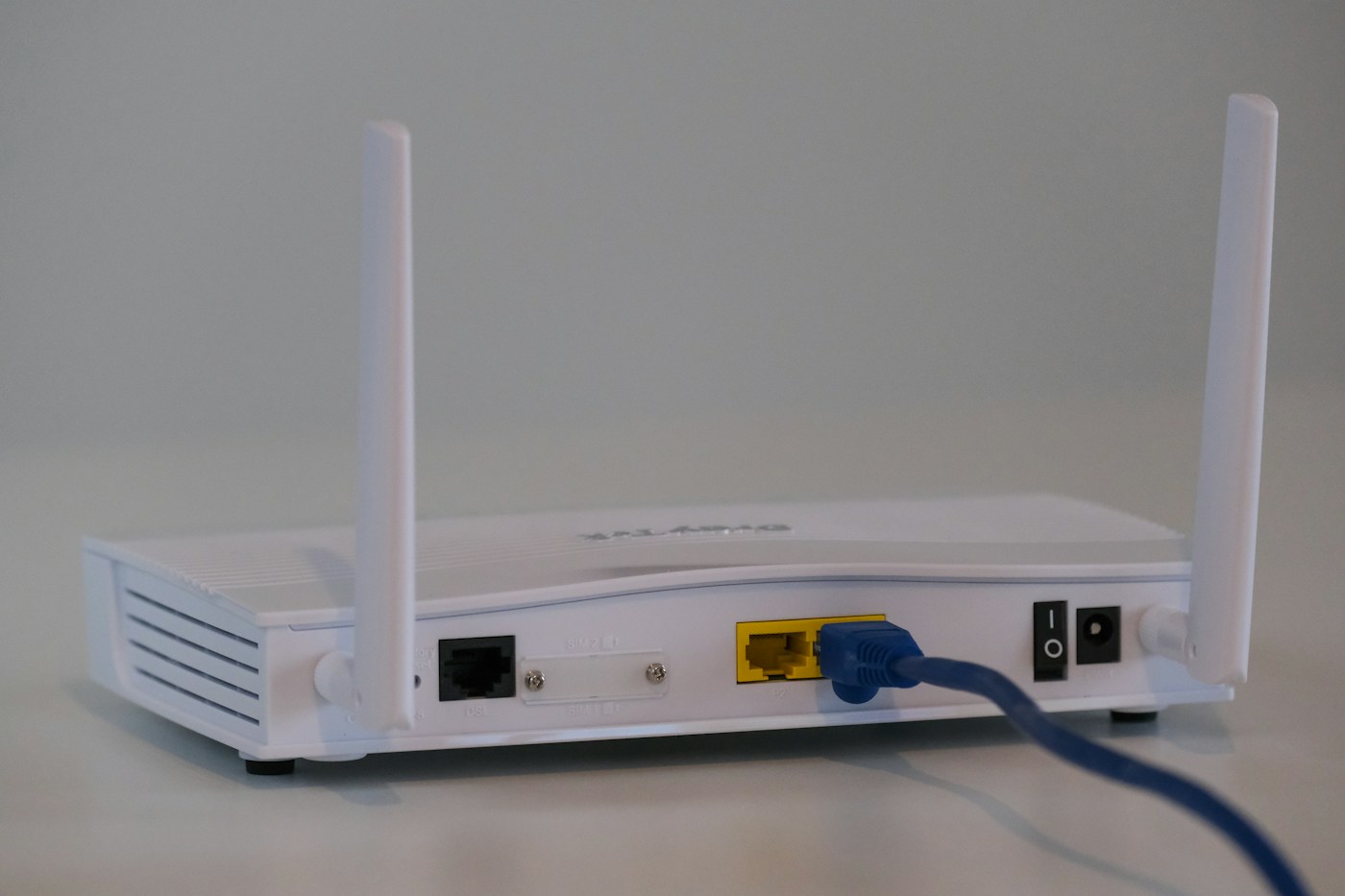 An Ethernet cable connected to a home router