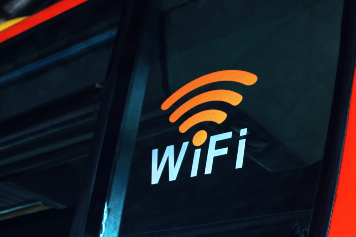 A Wi-Fi sign on a window