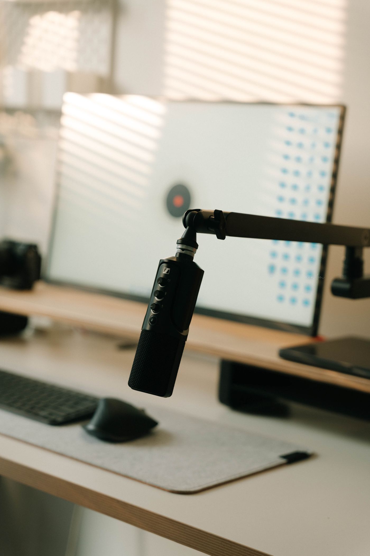 A desk microphone on an adjustable arm