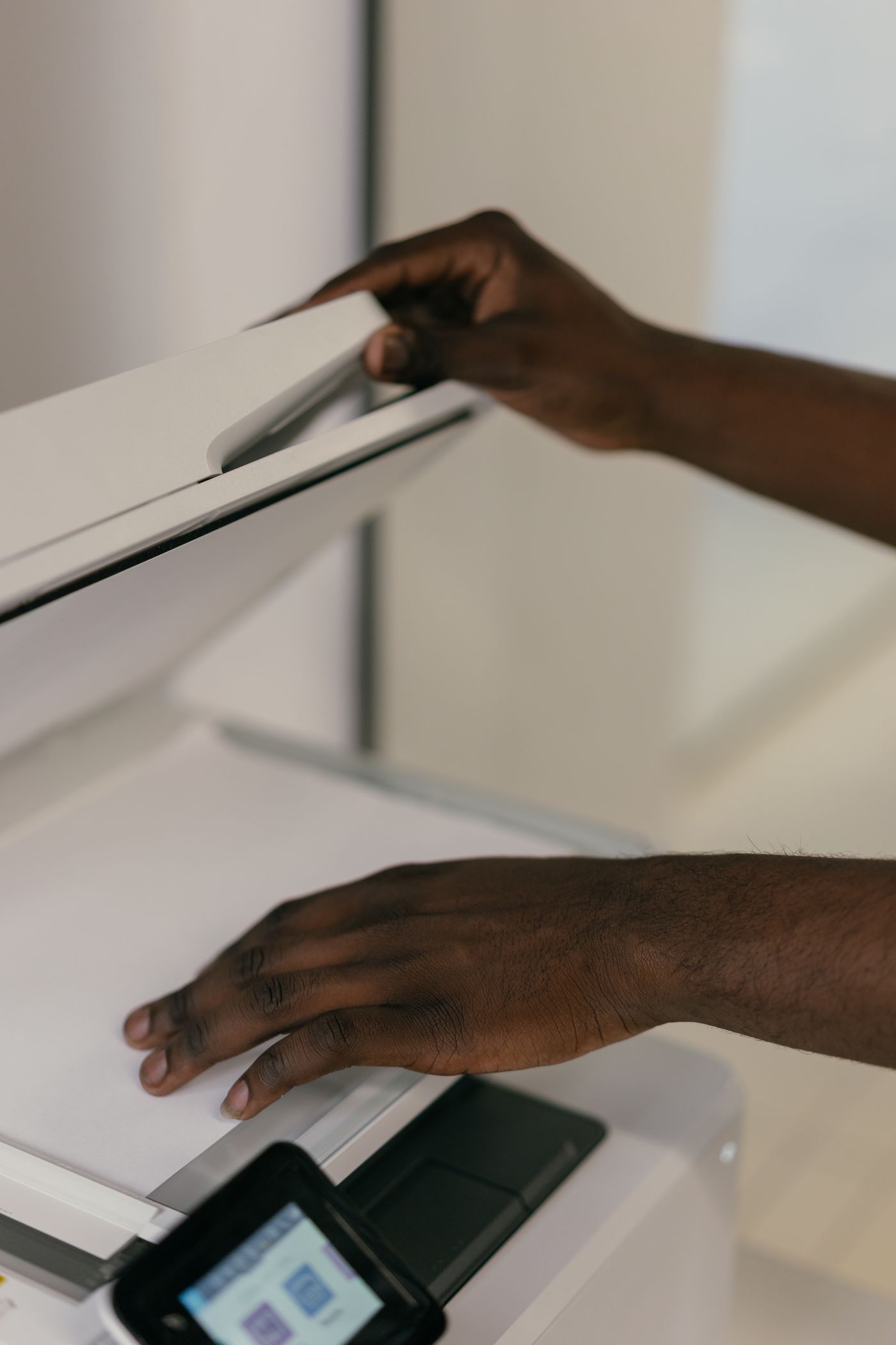 Document being positioned on a flatbed scanner